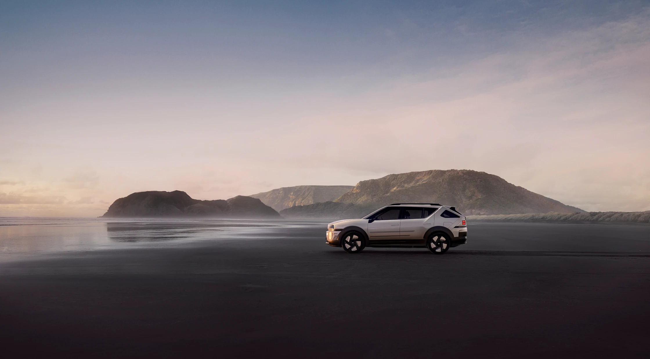 海岸の風景を横切る、全く新しいNEXOのサイド - Hyundai Mobility Japan (ヒョンデ ジャパン)